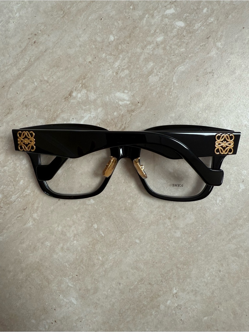 Loewe Black Glasses with Gold Anagram Logo.